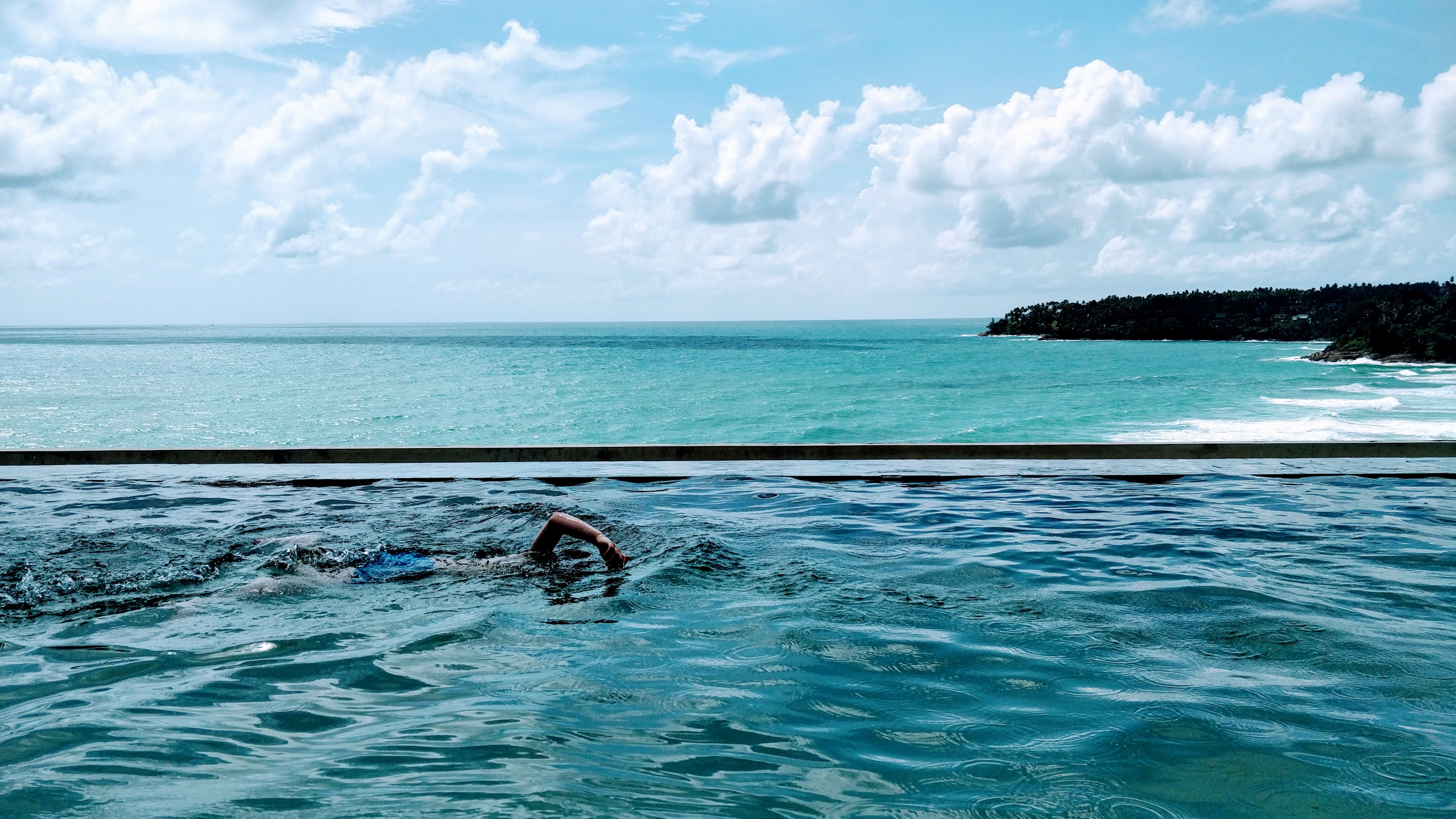 Endless pool swimming by the sea