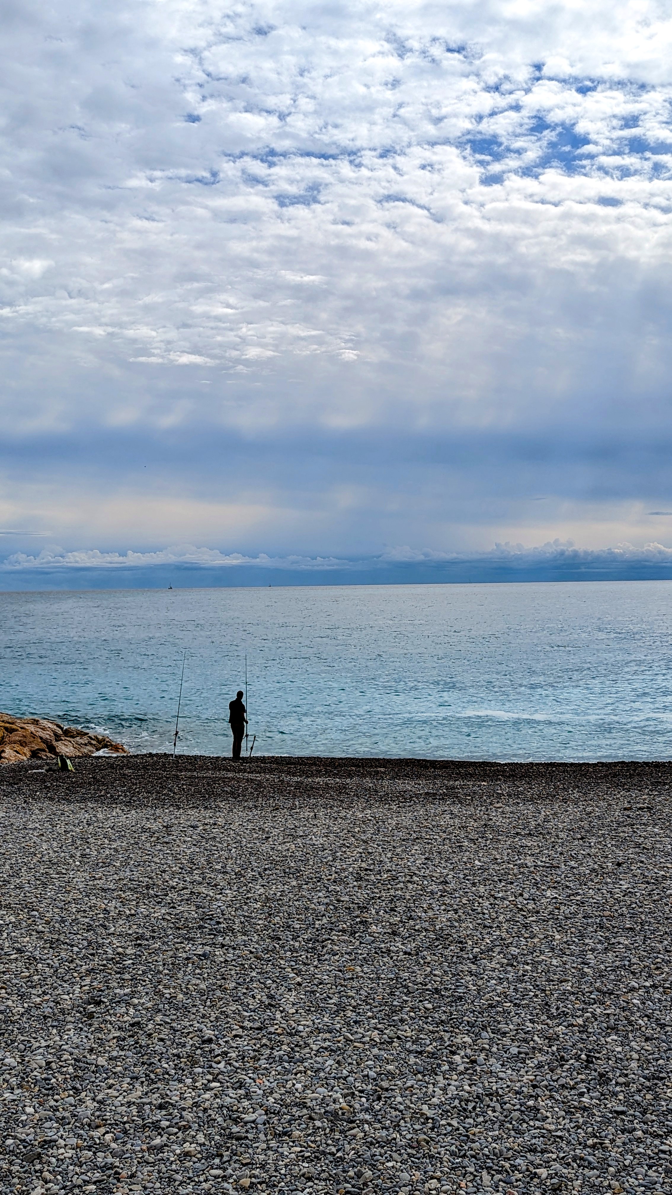 Fisherman on the promenade